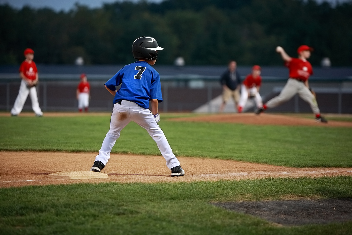 Youth baseball players getting exercise